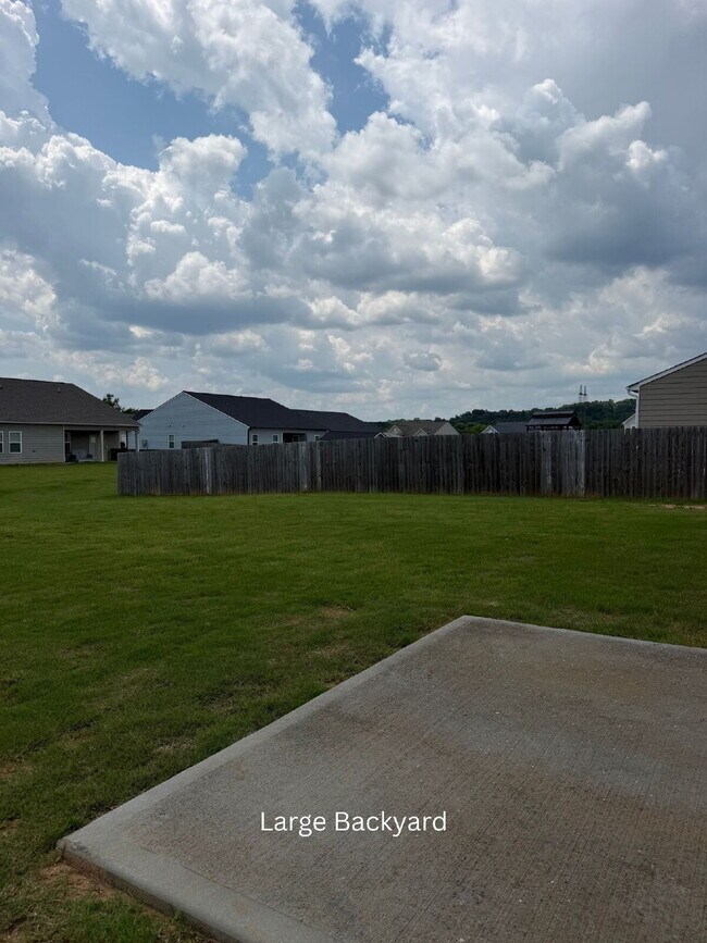 Building Photo - Spacious 5BR Home with Loft in Swim Community