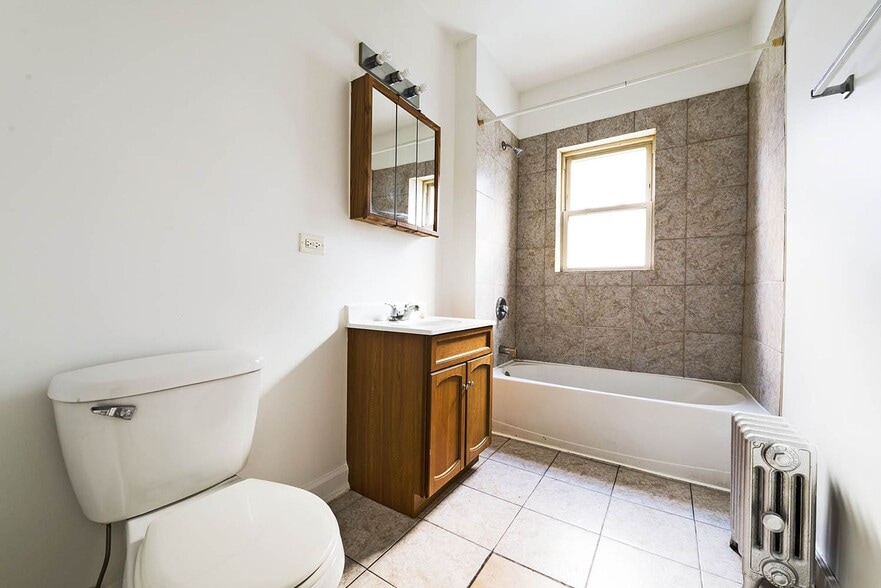 Building Photo - 7109-15 S Ridgeland Ave 1736-44 E 71st Pl Chicago, IL 60649