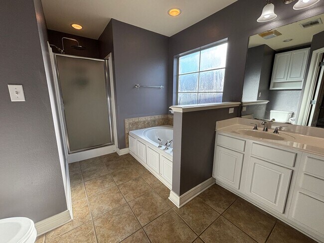 Building Photo - 4 BEDROOM WITH BONUS ROOM IN LEGACY SUBDIVISION