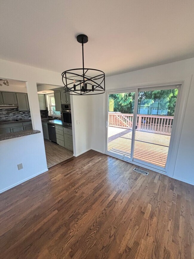 Building Photo - Gorgeous 4-Bd House | Huge Deck, Huge Fenced Yard, & Bonus Room!
