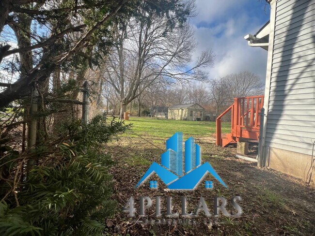 Building Photo - Charming 2 Bedroom Duplex in La Porte with Spacious Layout and Prime Location