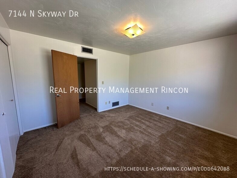 Building Photo - 7144 N Skyway Dr