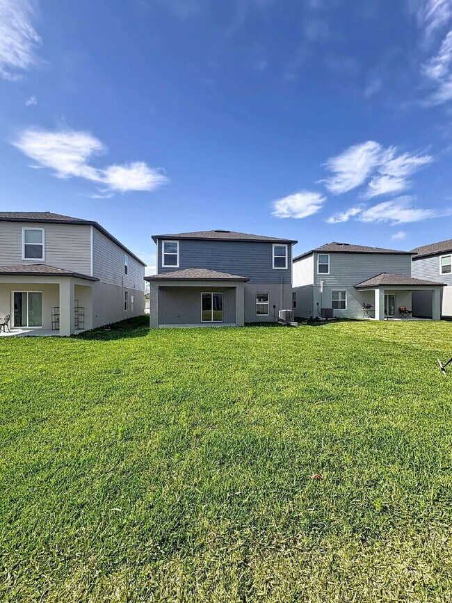 Building Photo - 8438 Blue Wave Ln E