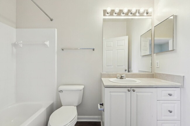 Step into this bright bathroom oasis, featuring modern elegance and functionality. - Redwine Creek