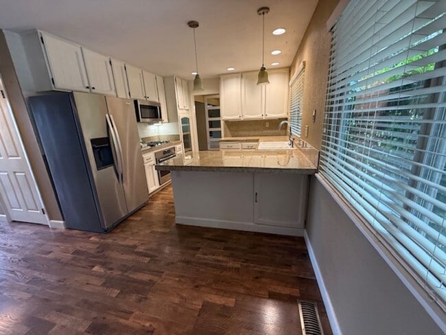 Building Photo - OPEN HOUSE this Wednesday 5pm-6:30pm - Private Redwood Setting | 4BR Home with Family Room, Bar &...