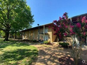 Building Photo - One Bedroom Condo, Second Floor, Assigned ...