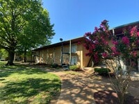Building Photo - One Bedroom Condo, Second Floor, Assigned ...