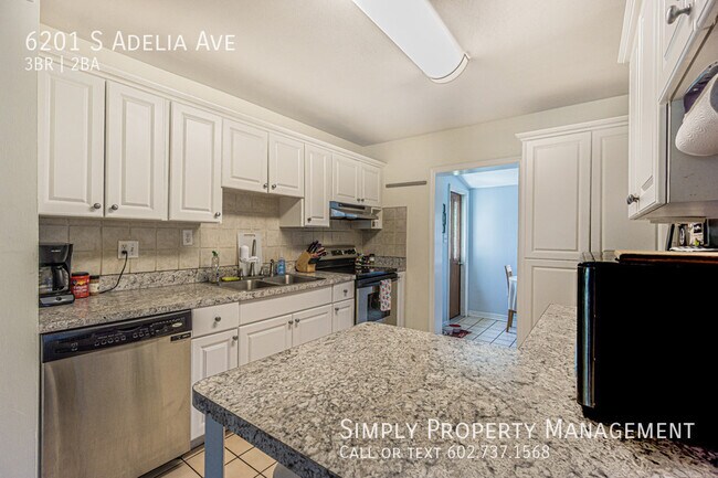 Building Photo - 6201 S Adelia Ave