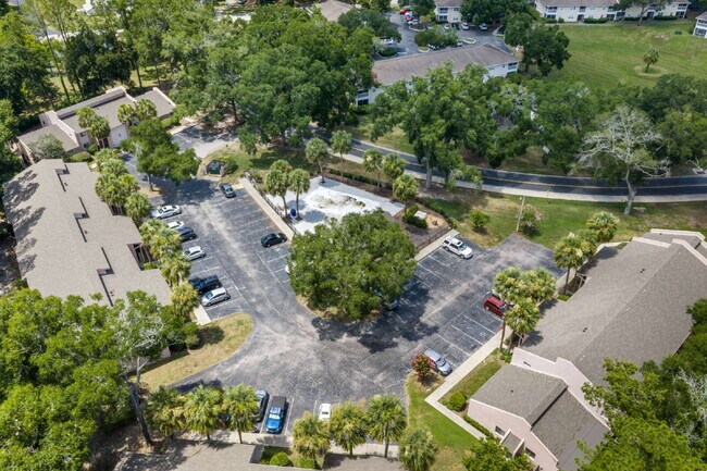 Building Photo - Freshly Updated 2BR Condo with Private Balcony, Community Pool, & In-Unit Laundry