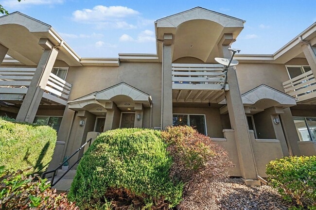 Building Photo - Beautiful 2BR Townhome in Gated Community with 2-Car Garage
