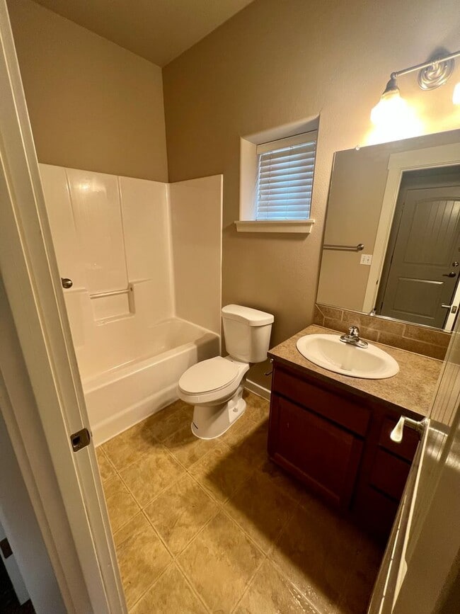 Building Photo - Spacious 4-Bedroom Home—Quick Drive to Dow...