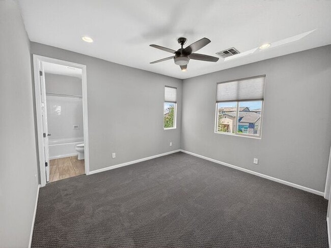 Building Photo - Stunning 5 Bed/5Bath Home in Gated Community – Over 3,100 SqFt of Modern Living -New Carpet throu...