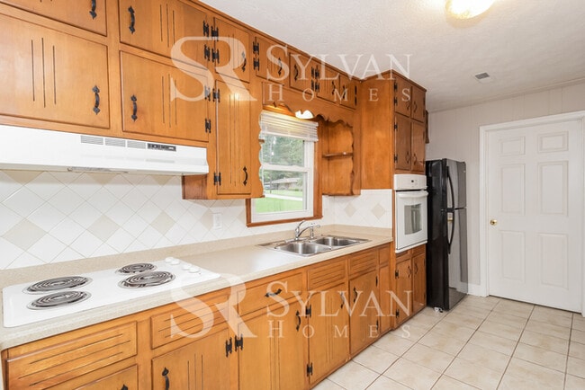 Building Photo - Turn the key. Enter. Smile. Repeat every day!