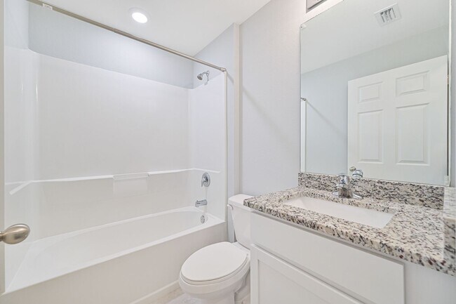 Building Photo - Spacious Three-Bedroom Home with Open Floor Plan, Large Yard