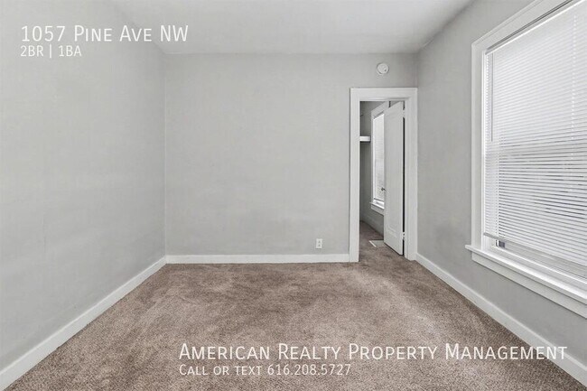 Building Photo - 1057 Pine Ave NW