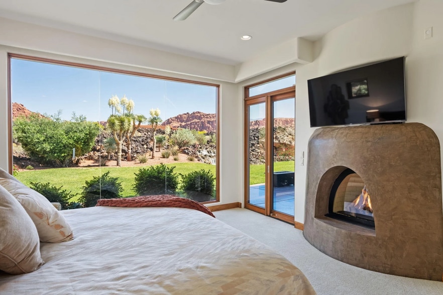 Suite-Style Bedroom With Kiva Fireplace & Garden Access - 1500 E Split Rock Dr