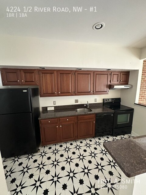 Building Photo - 4224 1/2 River Road, NW-#1