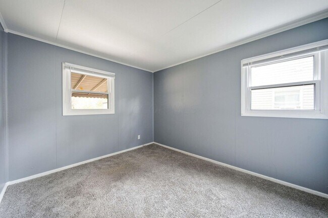 Building Photo - Affordable 3-Bedroom Home with Covered Pat...