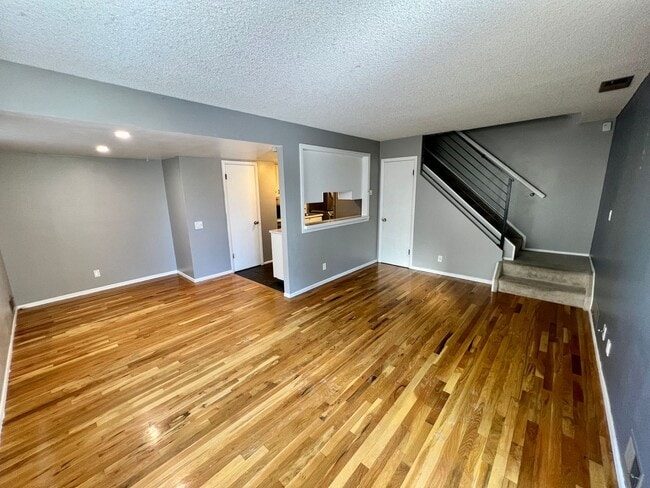 Building Photo - TWO STORY TOWNHOME, NEW FLOORING/CARPET, TWO TONE PAINT, STAINLESS APPLIANCES, WASHER/DRYER, CORN...
