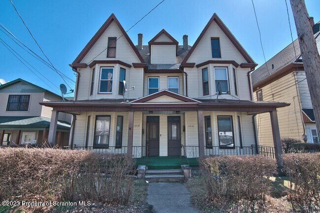 Building Photo - 1418 Capouse Ave