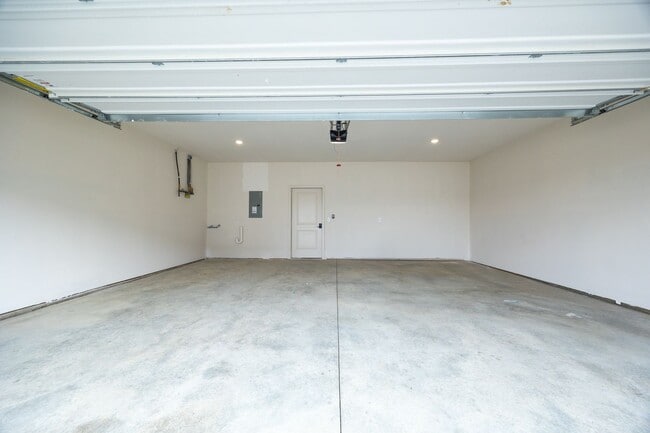 Building Photo - Brand New Three Bedroom Townhome in West L...