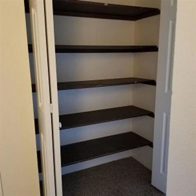Building Photo - Ground-Level Apartment Available Now at Sunset Villa!
