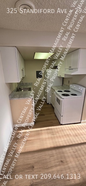 Building Photo - SPACIOUS 1 BEDROOM 1 BATH CONDO