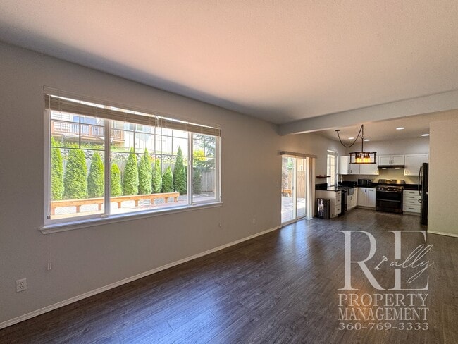 Building Photo - Dual Primary Suites, Huge Backyard Deck & Sun-Filled Living Spaces Near Everyday Conveniences