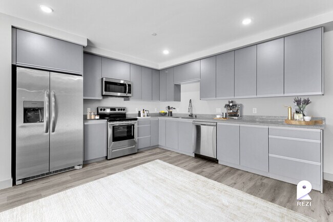 Building Photo - 7040 Woodman Ave