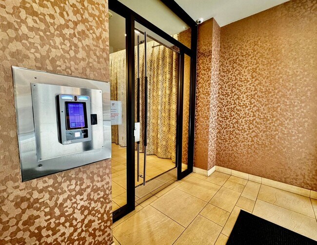 Building Photo - Corner Light. City Energy. Zero Compromise.