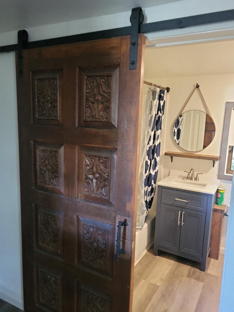 barn door to bath - 703 N Walnut St