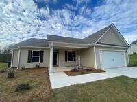 Building Photo - Spacious 4-Bedroom Home Near Victoria Brya...