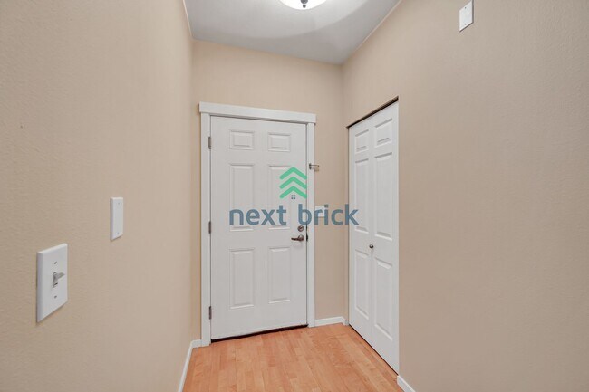 Building Photo - Rare Ground-Floor, End Unit with massive b...
