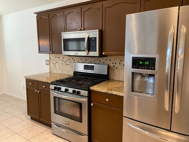 Building Photo - Lakefront 3-Bedroom Pool Home in Gated Com...