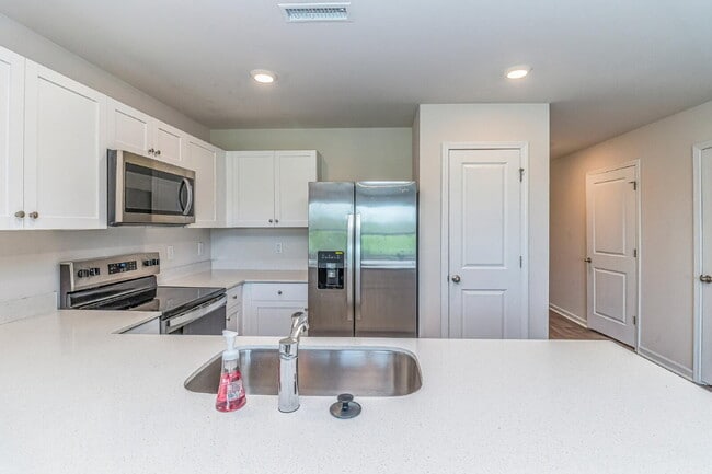 Building Photo - Modern 3 BR | 2.5 BA Townhome in Goldsboro *Newly Developed Seymour Village*