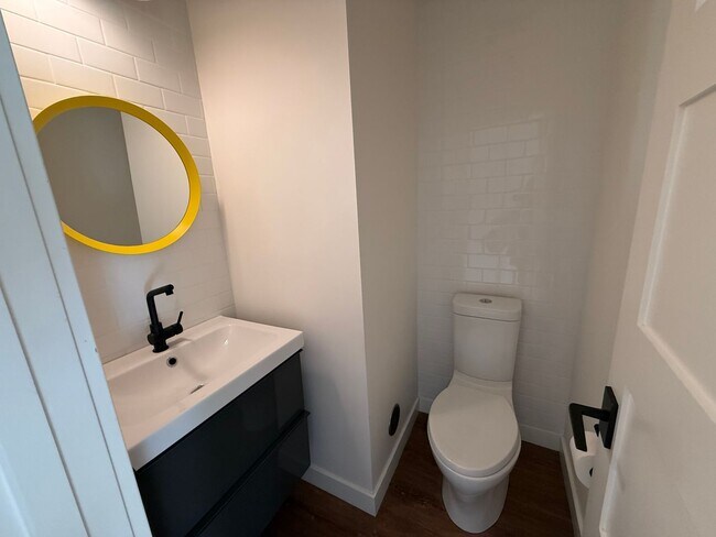 Building Photo - STUNNING THREE BEDROOM PLUS OFFICE MARINER GREEN CONDO WITH GREAT OUTDOOR SPACE