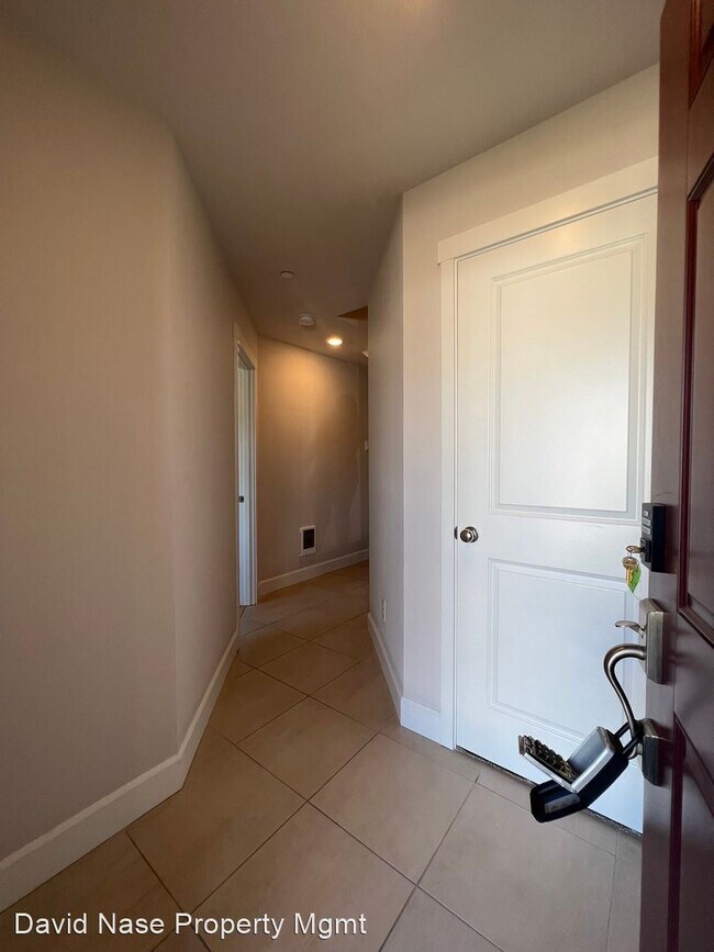 Building Photo - 4 br, 3.5 bath House - 17022 SW Lemongrass...