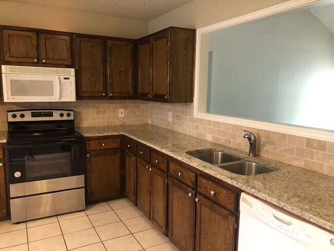 Building Photo - 3/2/2 Available May 2026