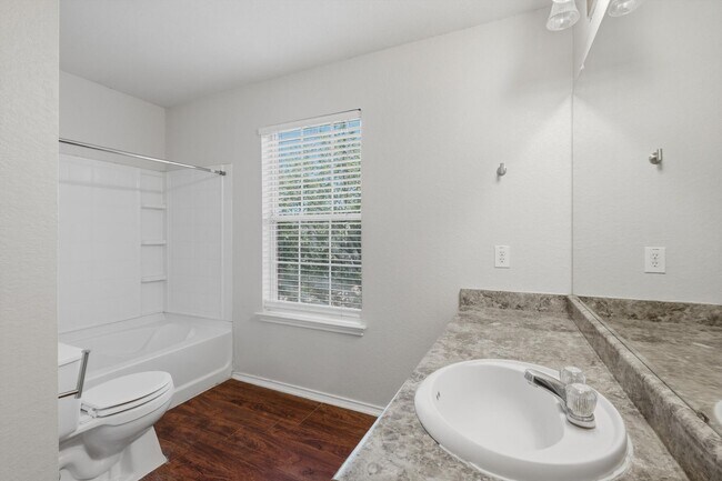 Building Photo - 4BR Home with Open Living Area & Included Appliances