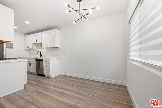 Building Photo - 3707 S Canfield Ave