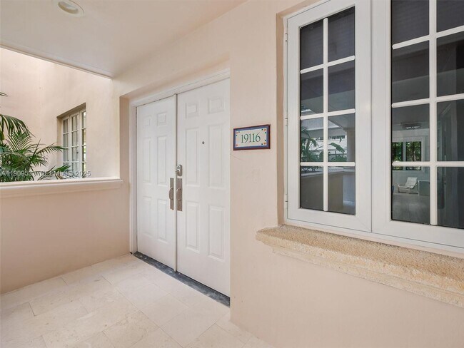 Building Photo - 19116 Fisher Island Dr