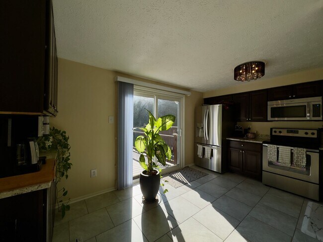 Building Photo - Modern 2-Bedroom Townhome with Spacious Ya...