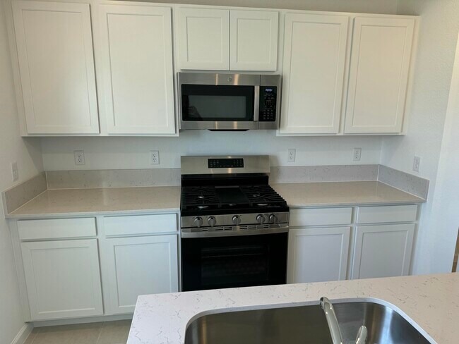 Building Photo - 10856 NW Everbreeze Dr