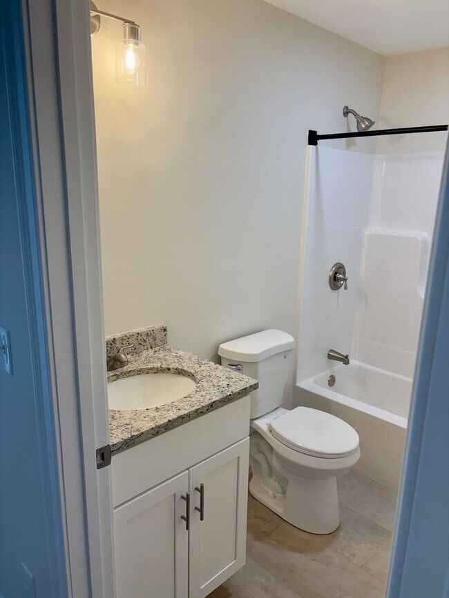 Building Photo - Brand New Townhouse-Style Living with Modern Finishes