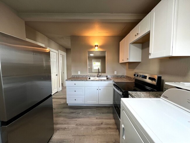 Building Photo - Non-Refundable & Security Deposit Total: $1200.00