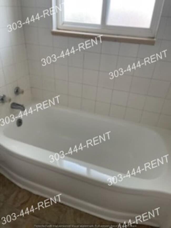 Building Photo - MUST SEE!!! Spacious 2 Bedroom Duplex Located 20 Minutes from Downtown Denver!!!!