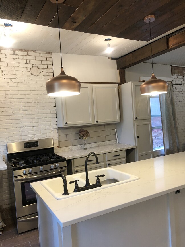 Restored kitchen. Quartz island. - 764 Eastern Ave