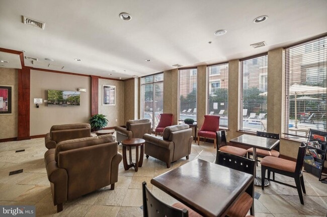 Building Photo - This townhouse style condo is located across the street from the Vienna Metro Station (Orange Line).