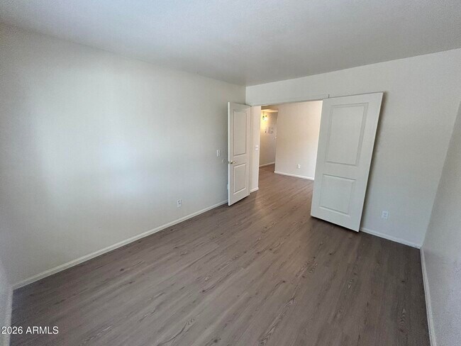 Building Photo - 42406 W Sunland Dr
