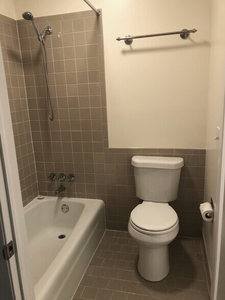 Tub and toilet room (Separate from vanity and bathroom sink.) - 515 Basswood Ave